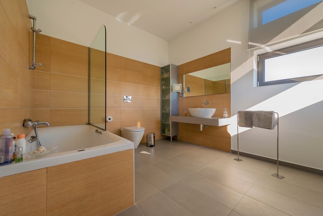 The minimal theme is carried on in the bathrooms, property for sale in Rhodes