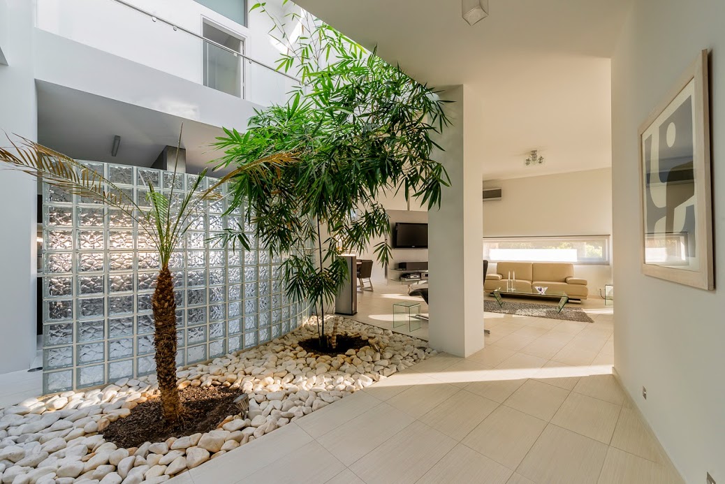 The indoor planting is a nice feature in this stunning property, property for sale in Rhodes