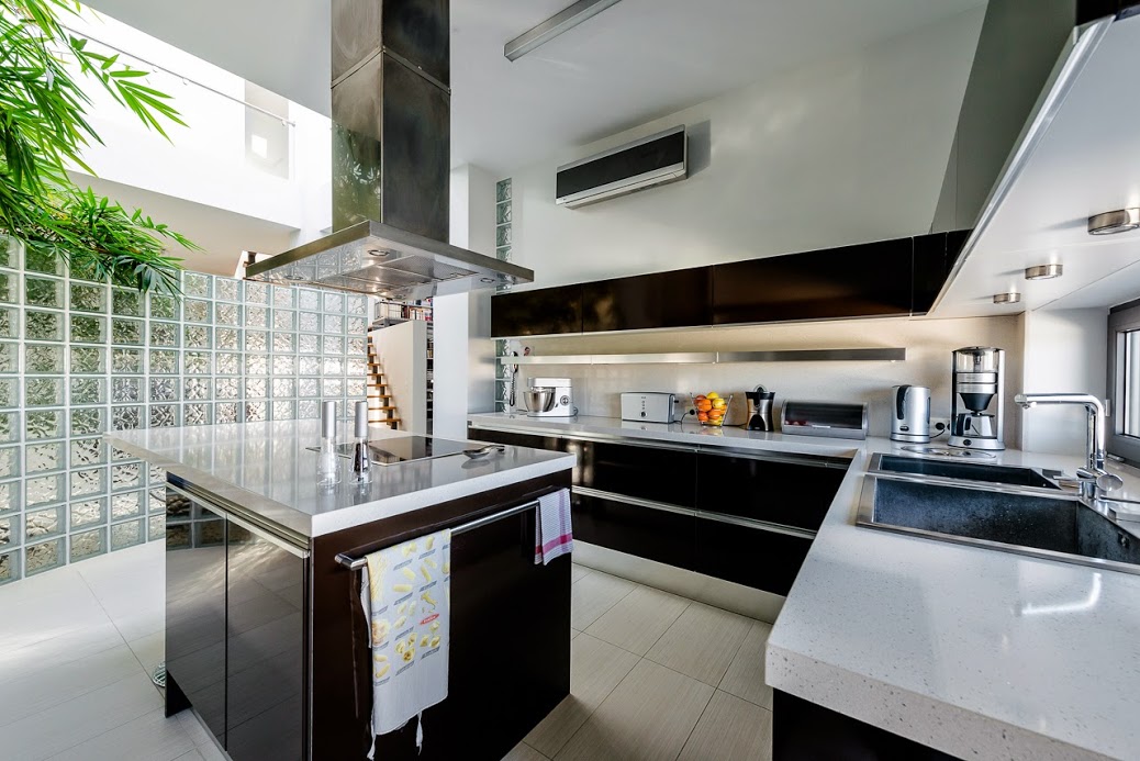 A sleek, modern kitchen, property for sale in Rhodes