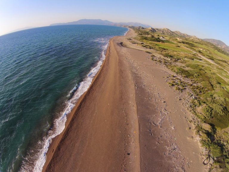 Sandy beach at the foot of the land land for sale in Rhodes, Greece