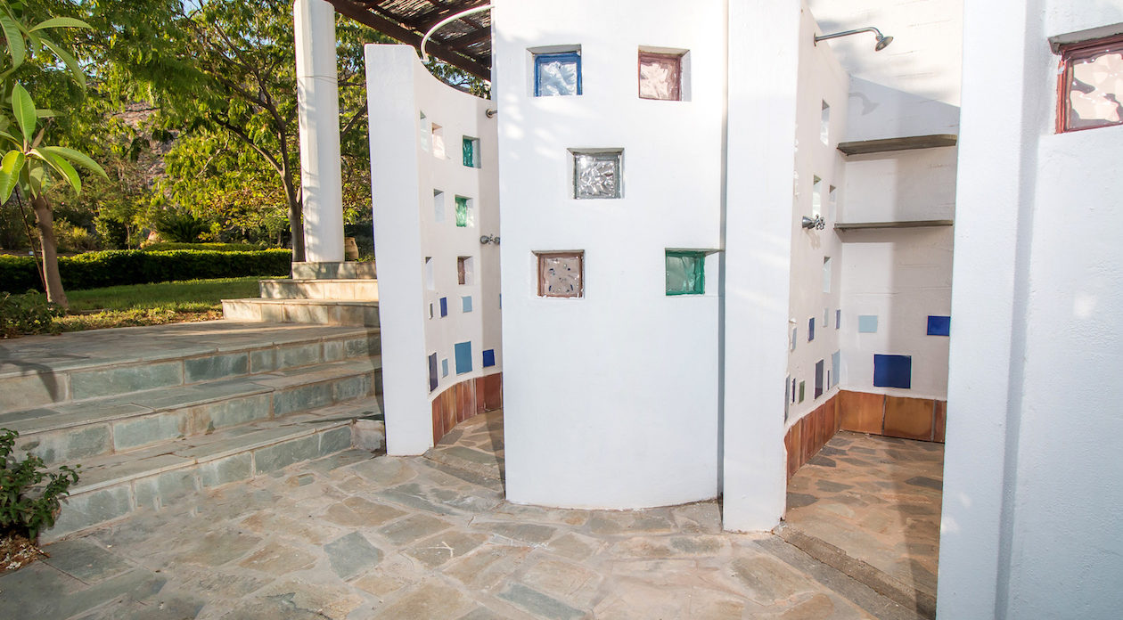 Outdoor shower area with square glass detail property for sale in Rhodes, Greece