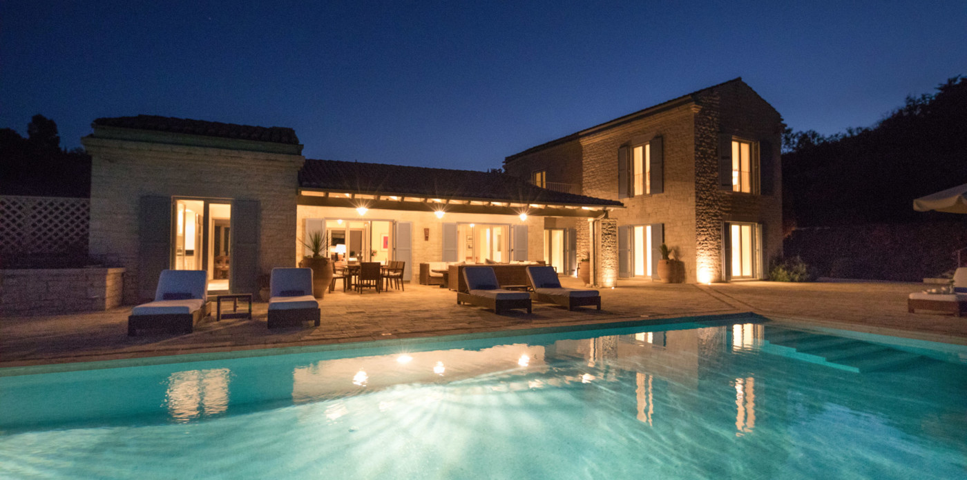 Emerald Bay villa beautiful at night, property for sale in Corfu, Greece