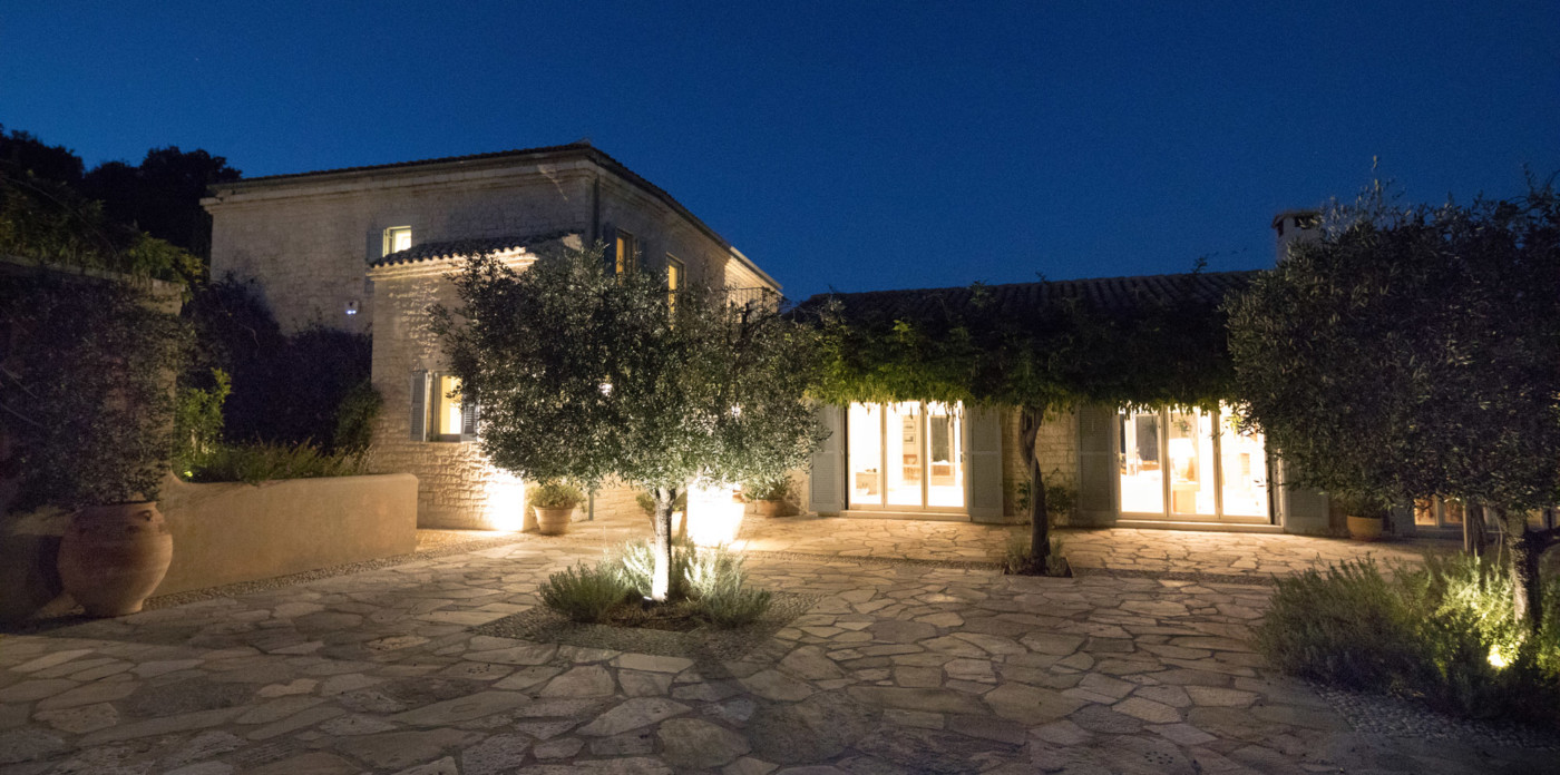 Emerald Bay villa at night, property for sale in Corfu, Greece