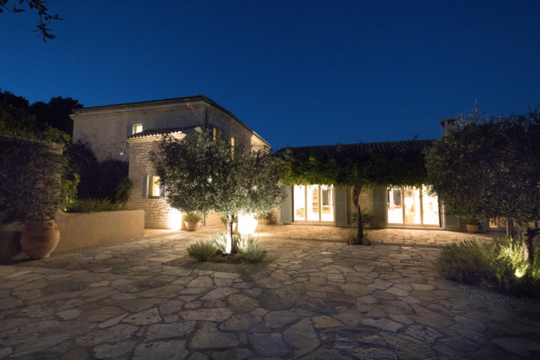 Emerald Bay villa at night, property for sale in Corfu, Greece
