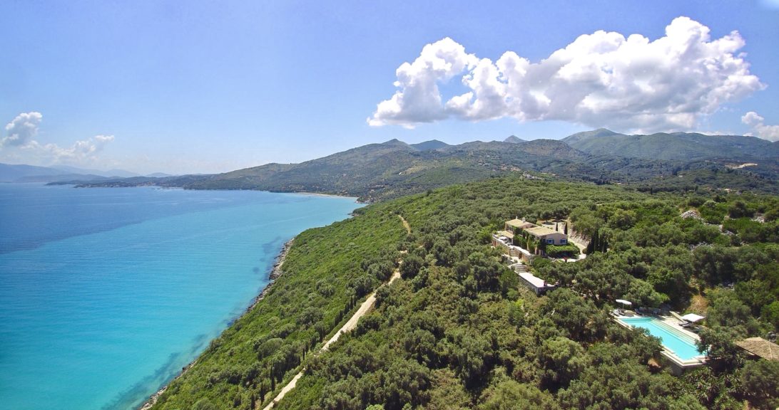 Linamia Estate aerial overlooking Corfu channel with distant views of the Albanian mountains