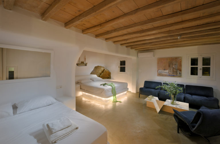 Pretty bedroom with wooden beams villa for sale in Mykonos Greece