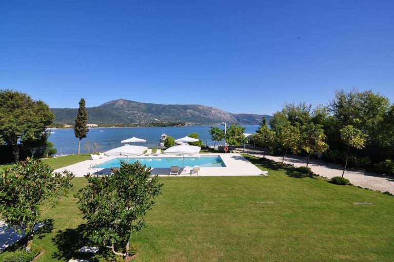 green lawns surround the pool property for sale in Corfu Greece