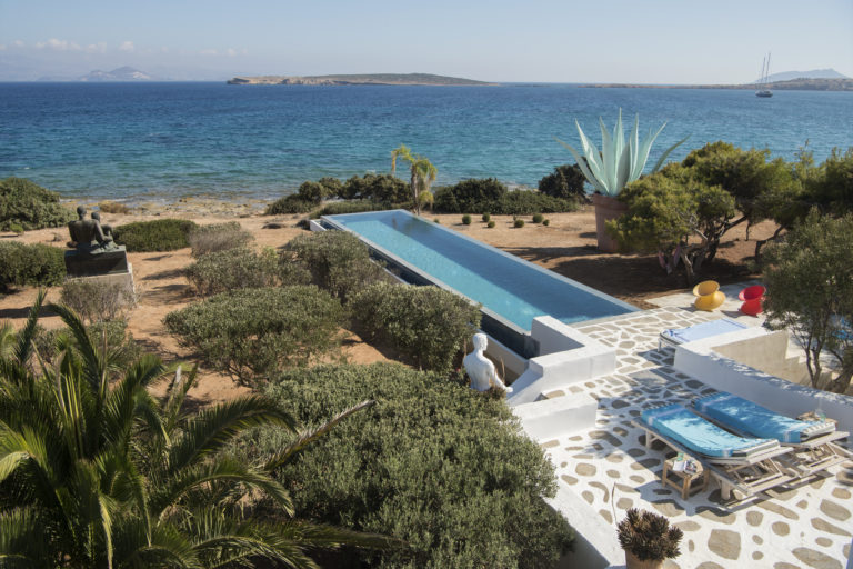 Pool leads to seafront property for sale in Paros Greec