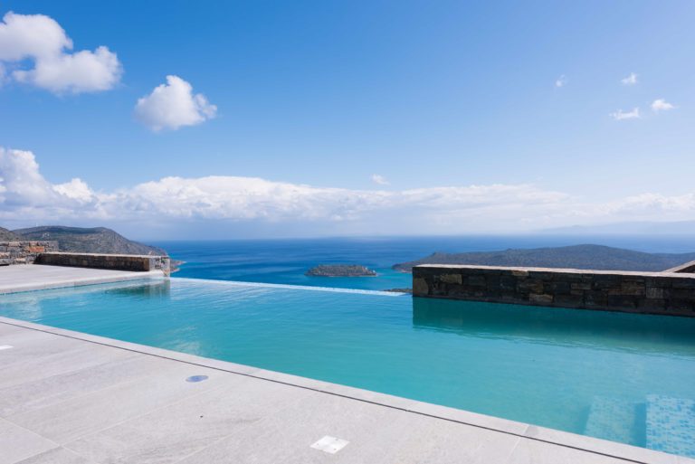 Pool Area overlooking Elounda Bay, property for sale in Crete Greece
