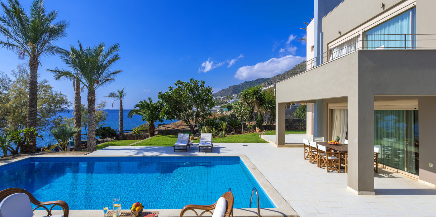 The pool area has patio to relax and enjoy the brilliant weather villa for sale in Crete Greece