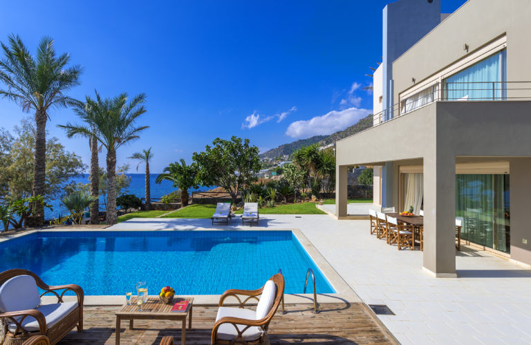The pool area has patio to relax and enjoy the brilliant weather villa for sale in Crete Greece