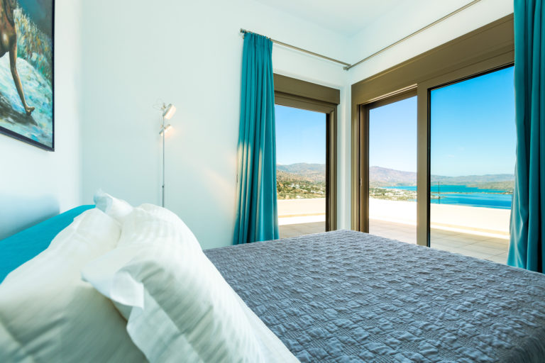 One of the bedrooms with sea views villa for sale in Crete Greece