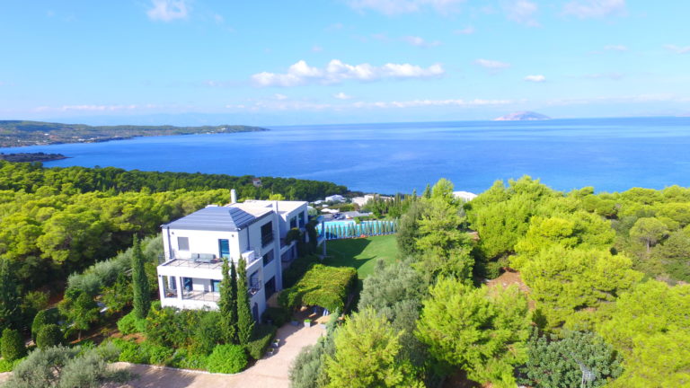 Bella, surrounded by greenery, property for sale in Porti Heli, Greece