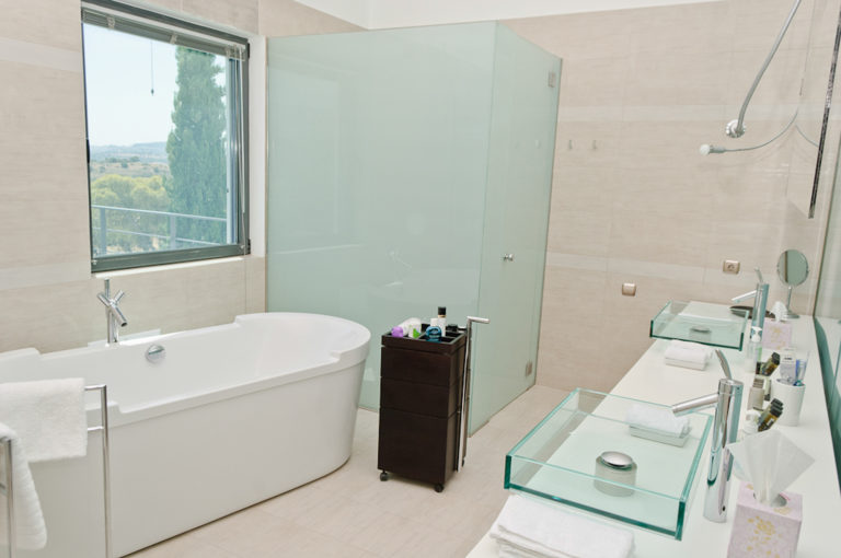 Bathroom with bath and shower, property for sale in Porto Heli, Greece