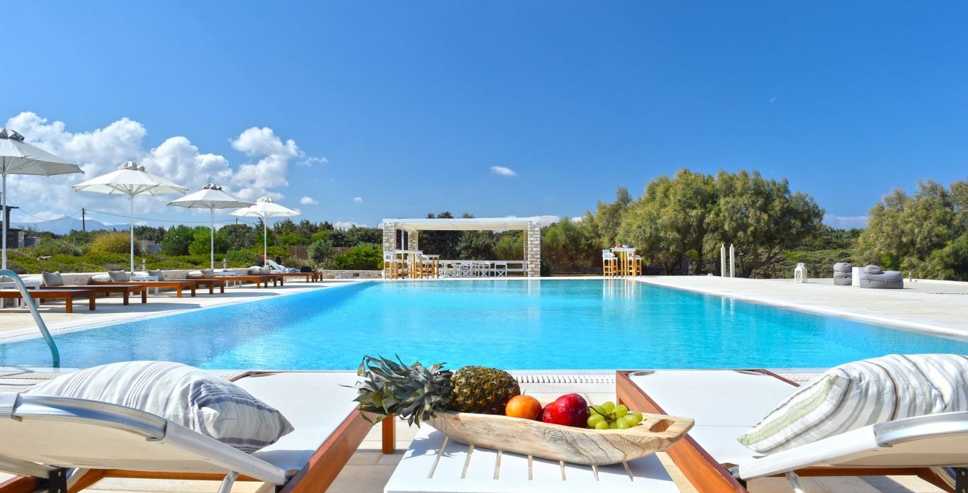 Spacious terrace and comfy loungers property for sale in Paros Greece