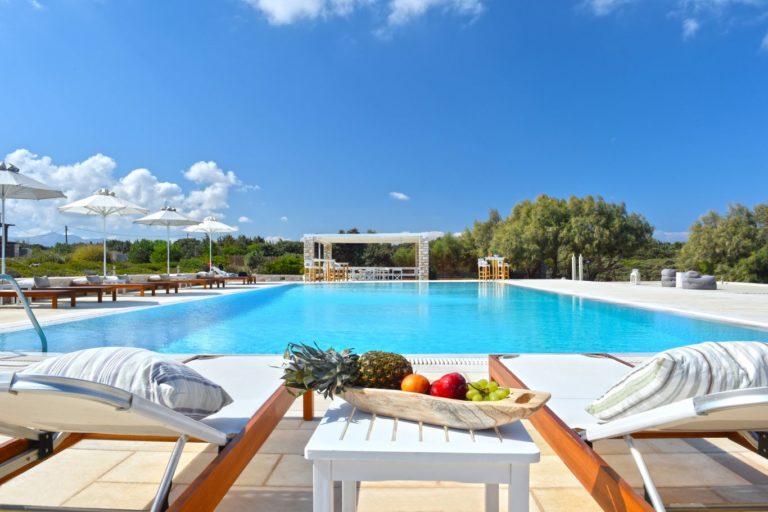 Spacious terrace and comfy loungers property for sale in Paros Greece