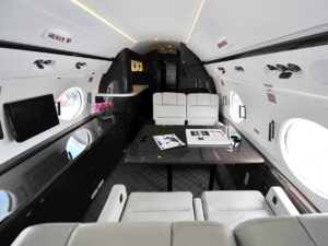 The interior of a Gulfstream private jet. Shutterstock/Jordan Tan