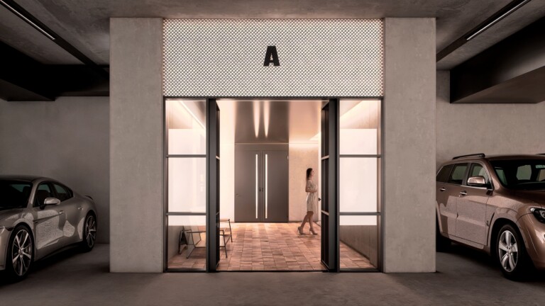 Entrance A of FIX Residences, Thessaloniki, with stone portal and glazed doors