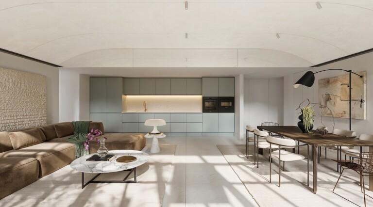 Kitchen and dining area of a FIX Residences apartment with pale green cabinetry and central island